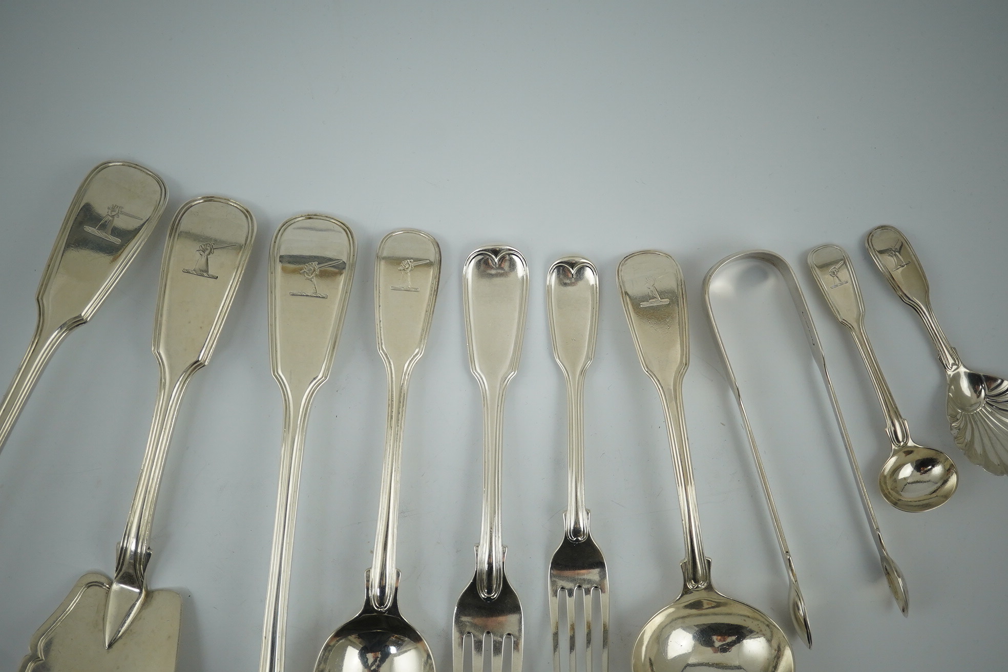 A part canteen of William IV fiddle and thread pattern flatware by William Chawner II